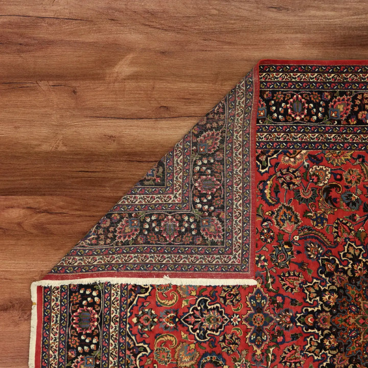 10'2" x 13'0" RED AND NAVY MASHAD PERSIA FLORAL