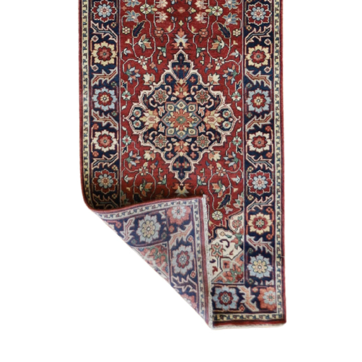 2' 7" x 18' 1" RUST AND NAVY SERAPI GEOMETRIC INDIAN RUG