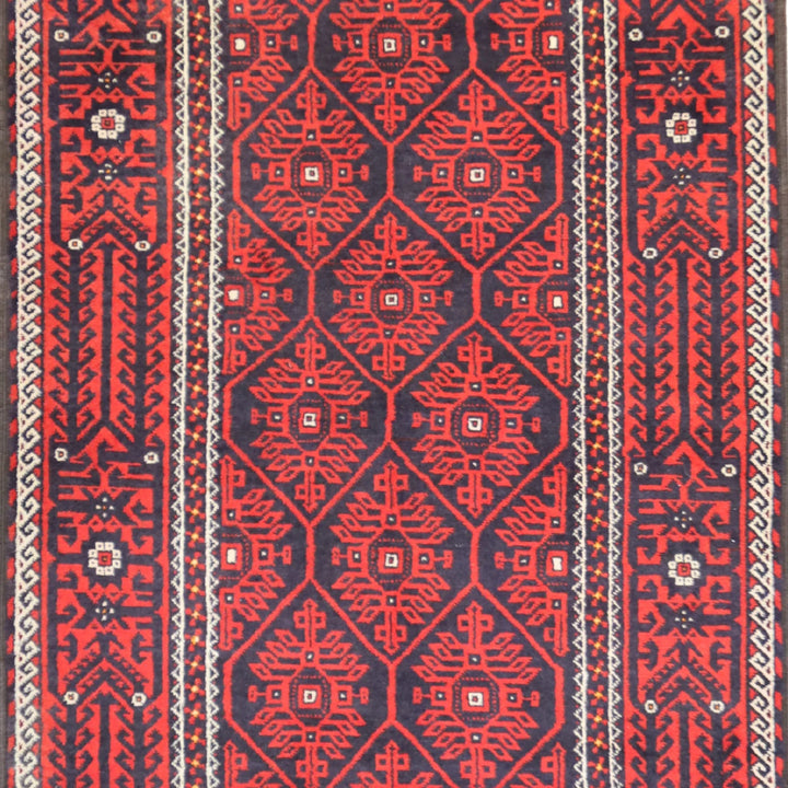 4'10" x 7'0" BLACK AND RED BALUCH SEMIANTIQUE PERSIAN RUG