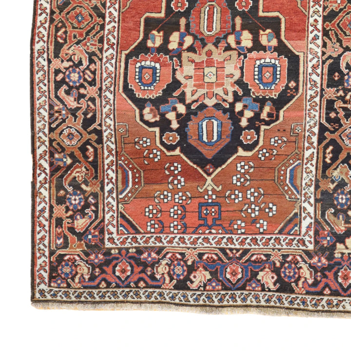 4'3" x 6'10" RUST AND BROWN BAKHTIARI ANTIQUE PERSIAN RUG