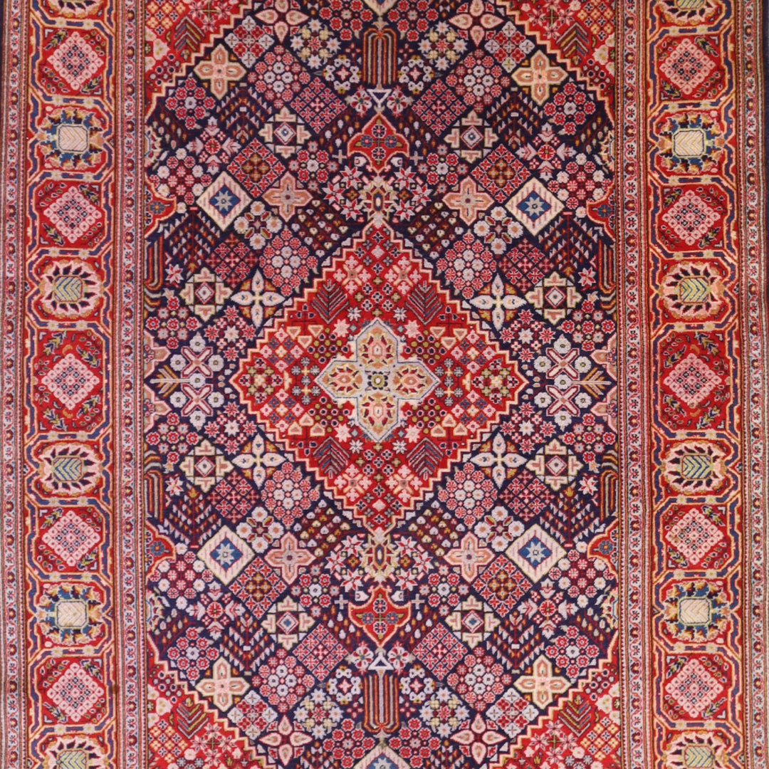 4'5" x 6'11" NAVY AND RED KASHAN GEOMETRIC PERSIAN RUG