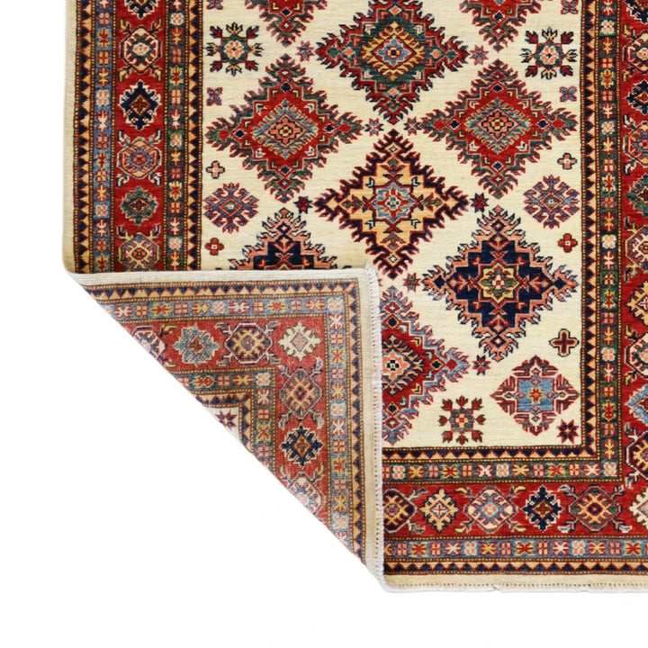 3'10" x 6'3" BEIGE AND RED KAZAK GEOMETRIC PAKISTANI RUG