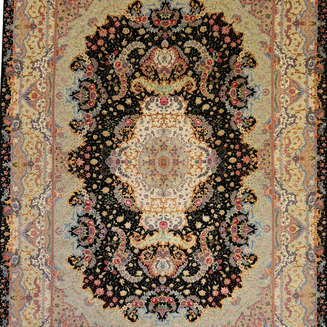 8'1" x 11'6" BLACK AND GREEN TABRIZ FLORAL PERSIAN RUG