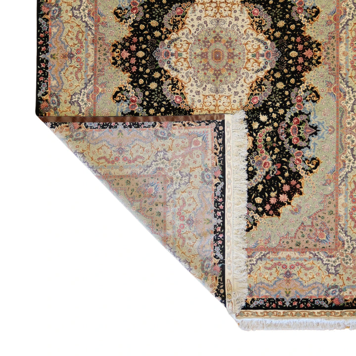 8'1" x 11'6" BLACK AND GREEN TABRIZ FLORAL PERSIAN RUG