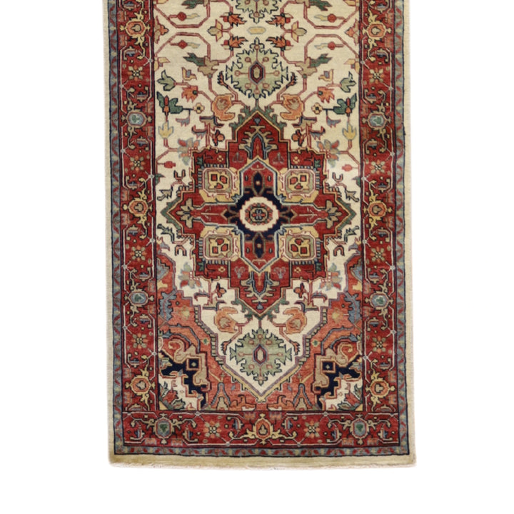 2'7" x 10'3" BEIGE AND RED SERAPI GEOMETRIC INDIAN RUG