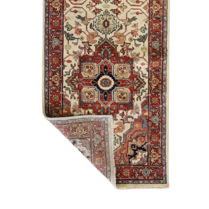 2'7" x 10'3" BEIGE AND RED SERAPI GEOMETRIC INDIAN RUG