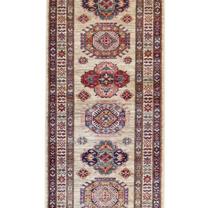 2' 9" x 10' 1" BEIGE AND BEIGE KAZAK GEOMETRIC PAKISTANI RUG