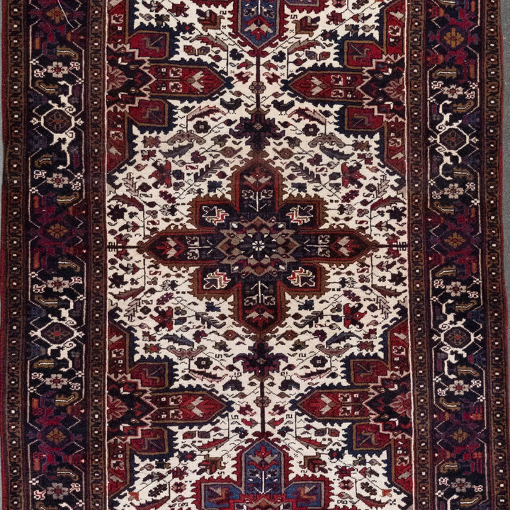 4' 11" x 12' 0" - RED AND NAVY HERIZ GEOMETRIC PERSIAN RUG ( 150 x 366 CM )