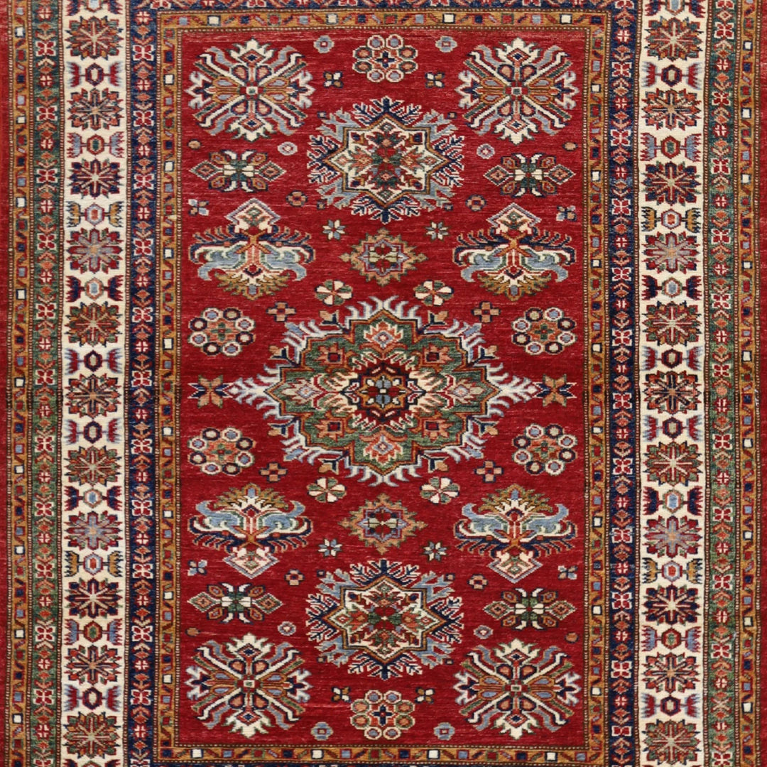 4'2" x 5'6" RED AND IVORY KAZAK GEOMETRIC PAKISTANI RUG