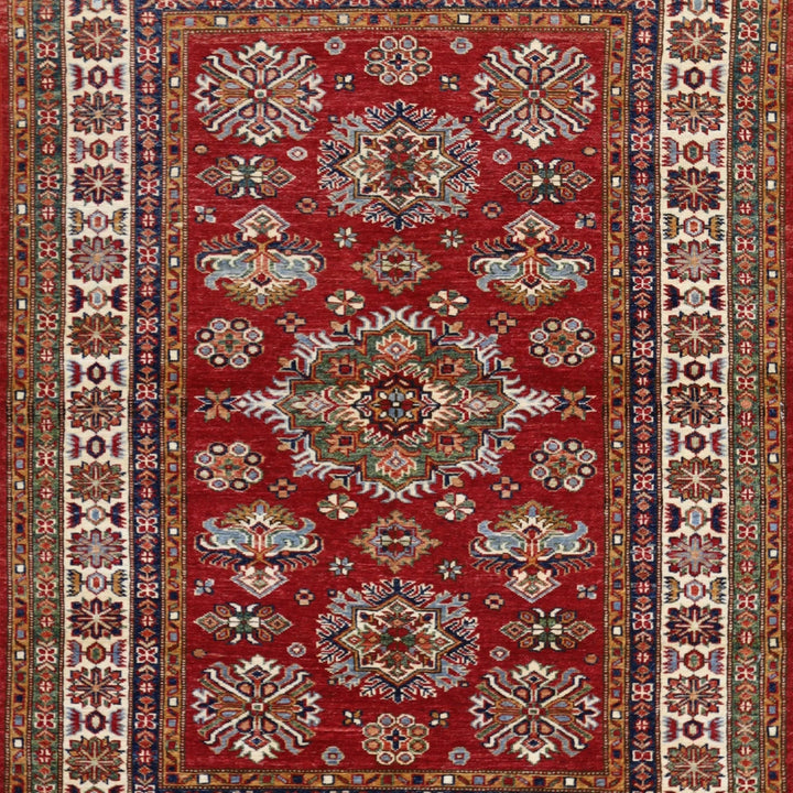 4'2" x 5'6" RED AND IVORY KAZAK GEOMETRIC PAKISTANI RUG