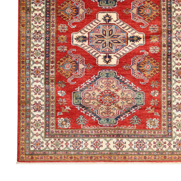 4'2" x 5'8" RED AND IVORY KAZAK GEOMETRIC PAKISTANI RUG
