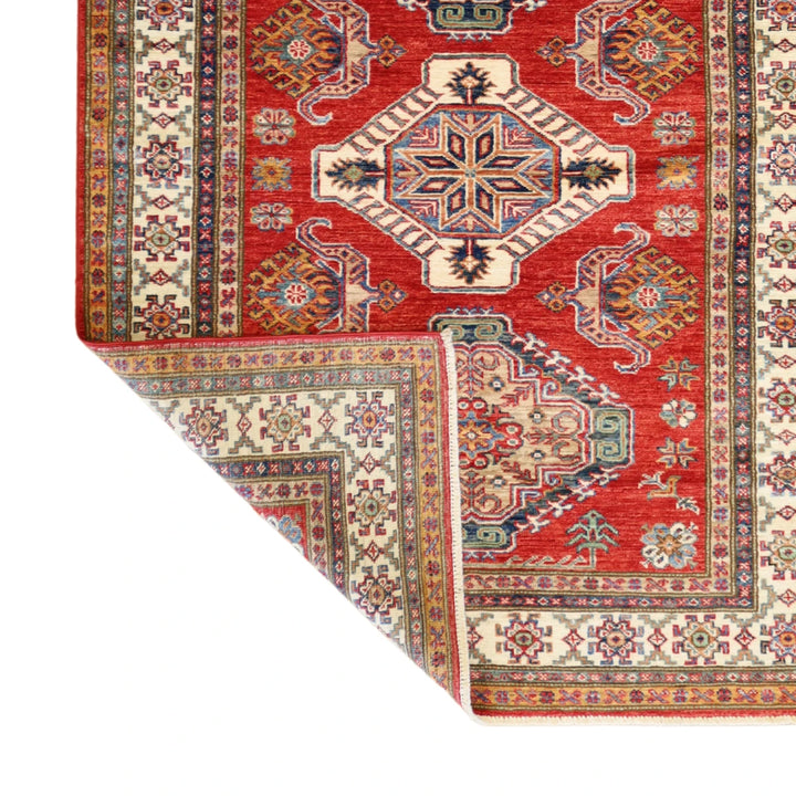 4'2" x 5'8" RED AND IVORY KAZAK GEOMETRIC PAKISTANI RUG
