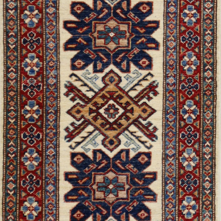 1'11" x 3'0" IVORY AND RED KAZAK GEOMETRIC PAKISTANI RUG