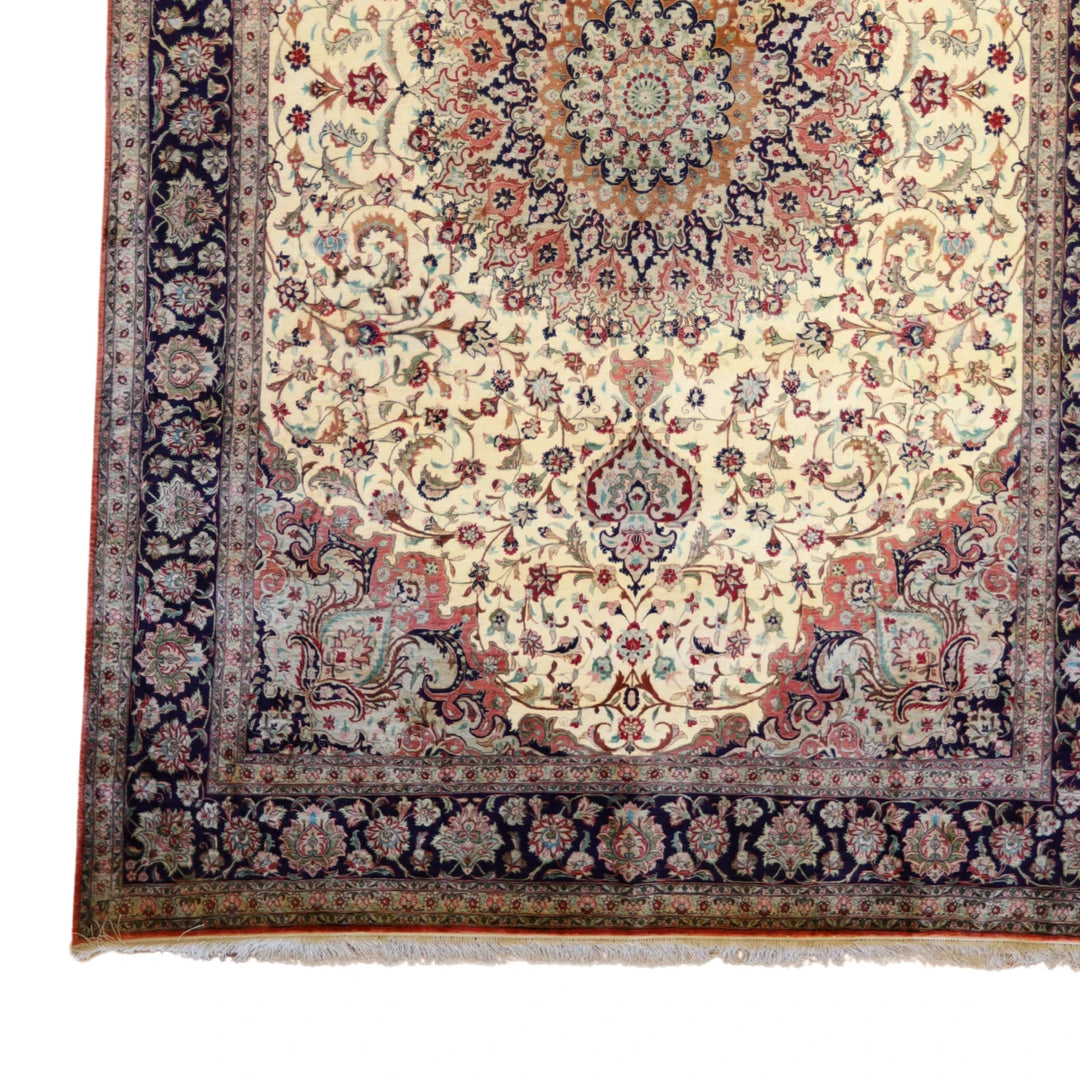 6'6" x 9'10" BEIGE AND NAVY QUM FLORAL PERSIAN RUG
