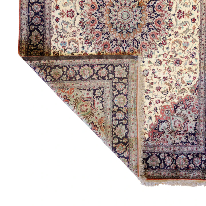 6'6" x 9'10" BEIGE AND NAVY QUM FLORAL PERSIAN RUG