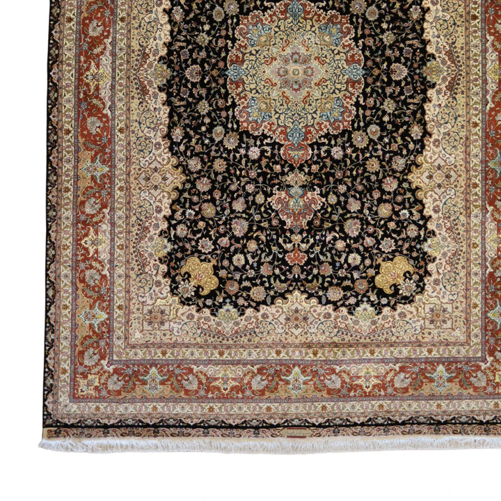 8'2" x 12'0" BLACK AND RUST TABRIZ FLORAL PERSIAN RUG