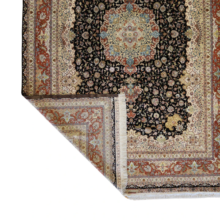 8'2" x 12'0" BLACK AND RUST TABRIZ FLORAL PERSIAN RUG