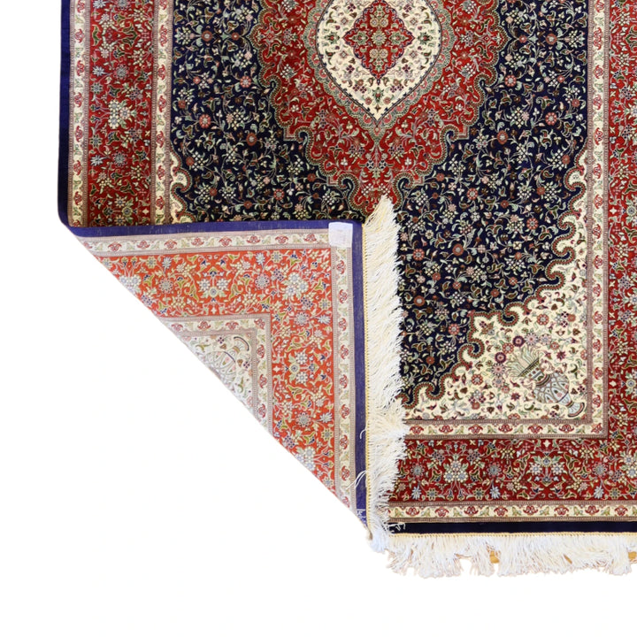 4'3" x 6'6" NAVY AND RED QUM FLORAL PERSIAN RUG