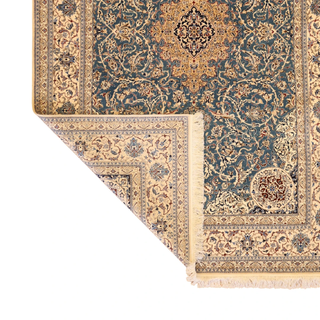 4'11" x 7'4" BLUE AND IVORY NAEIN FLORAL PERSIAN RUG