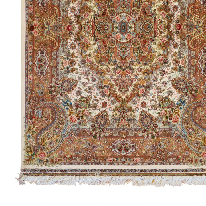4'10" x 7'1" BEIGE AND SALMON TABRIZ FLORAL PERSIAN RUG