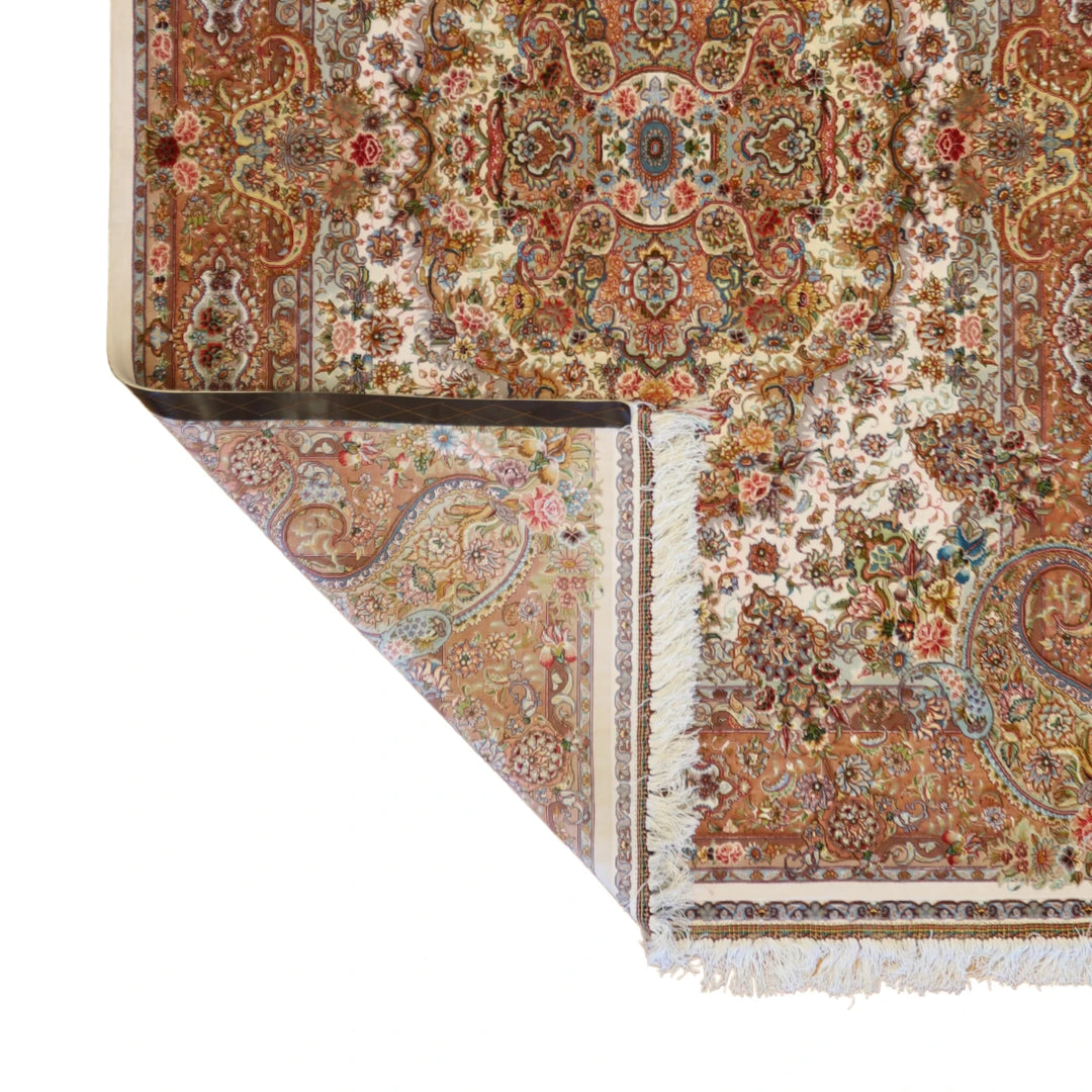 4'10" x 7'1" BEIGE AND SALMON TABRIZ FLORAL PERSIAN RUG